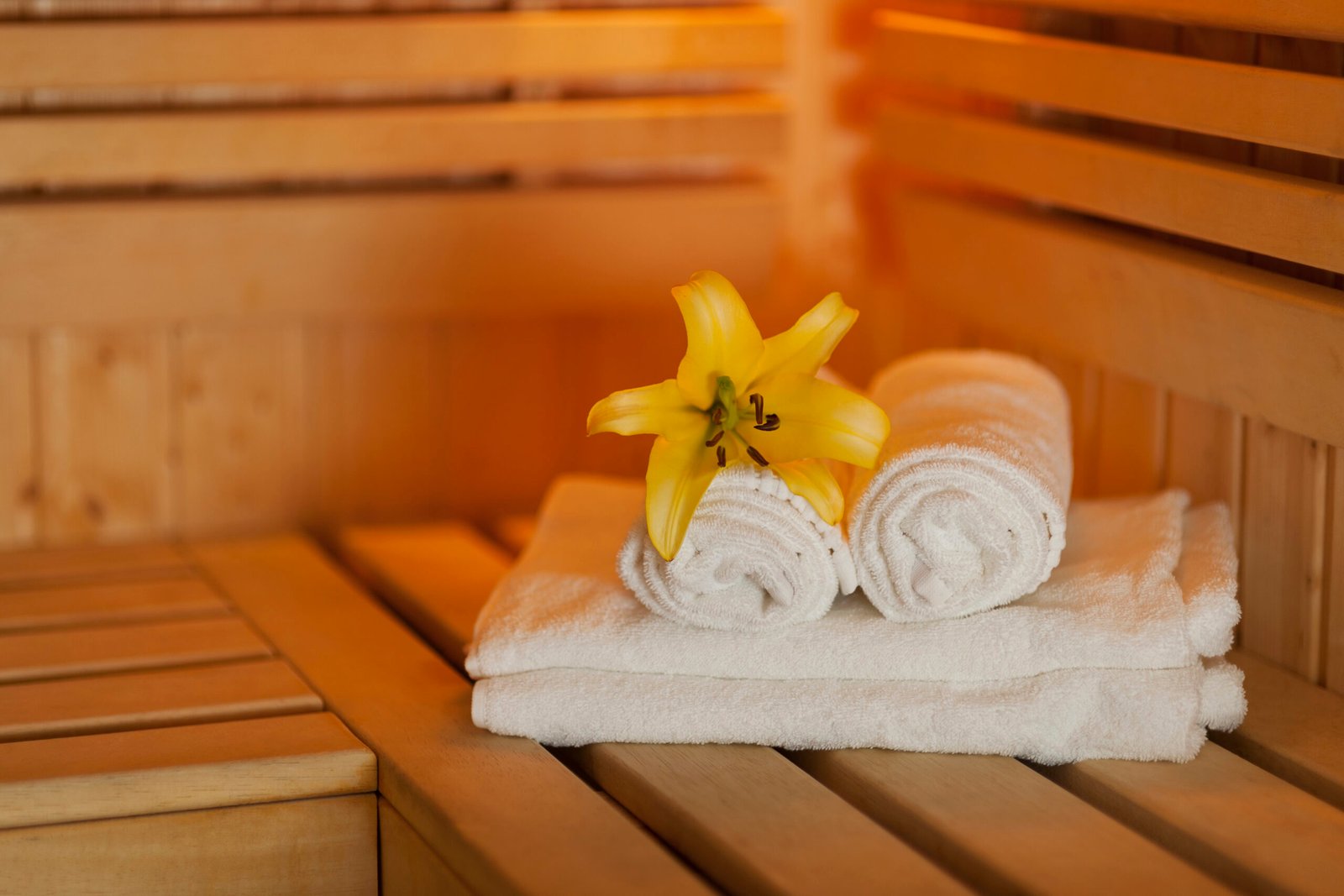 Spa 2 close up fresh towels yellow lily sauna scaled