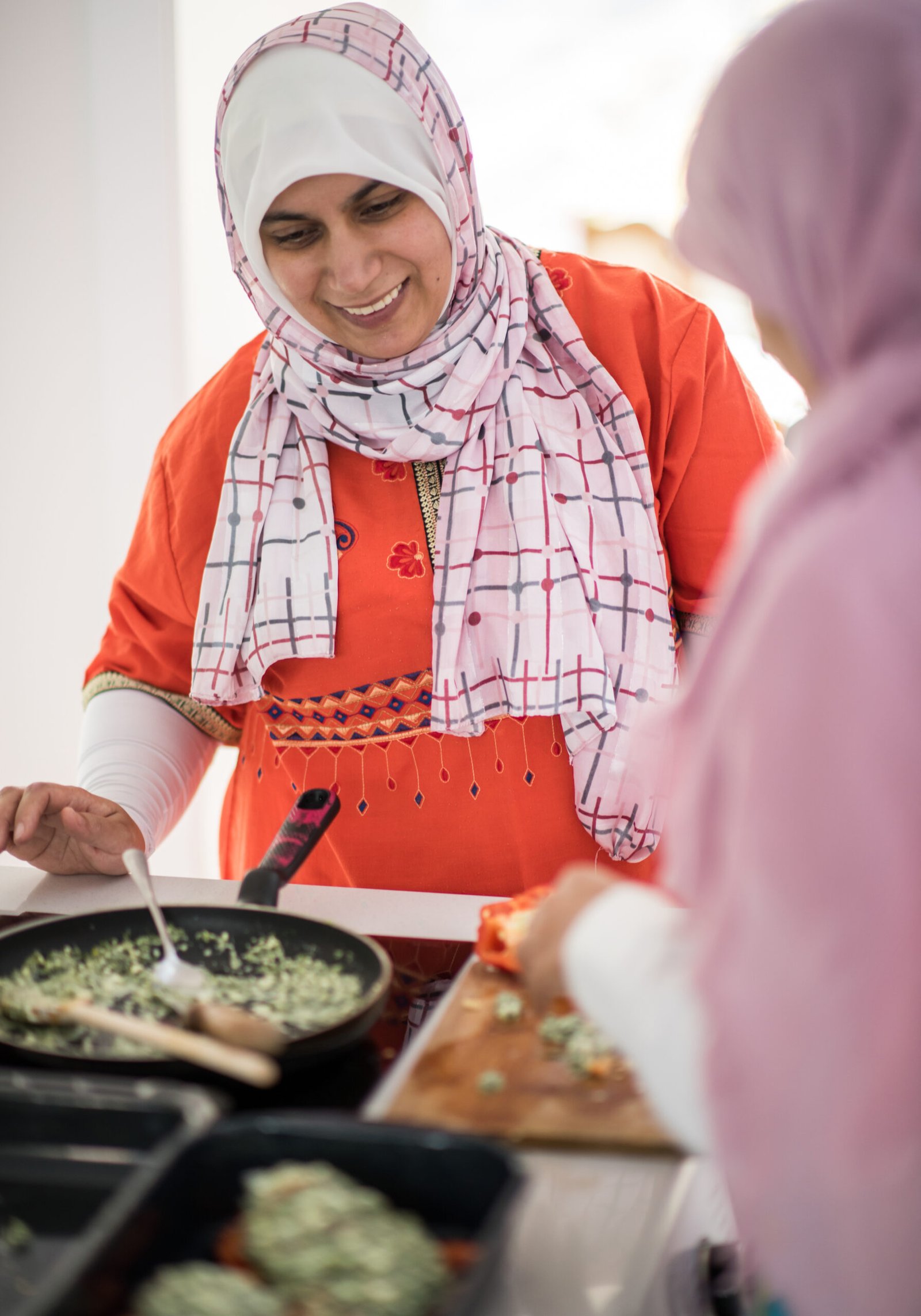 Experiences 4 two muslim women working kitchen scaled