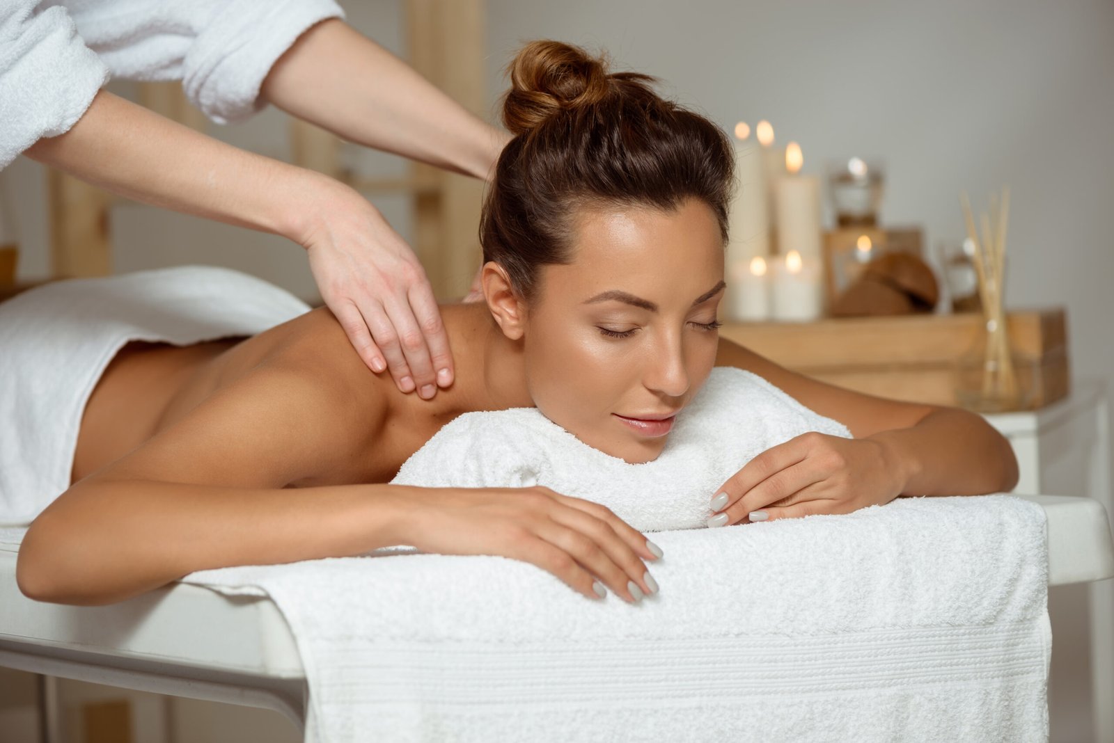 Spa 1 young attractive woman having massage relaxing spa salon scaled
